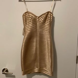 XXS BCBG strapless mini dress in light gold.